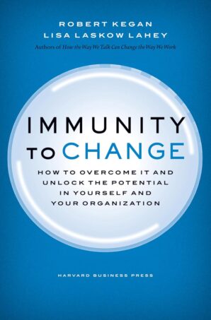 Book cover for 'Immunity to Change' by Robert Kegan and Lisa Laskow Lahey, published by Harvard Business Press, featuring organizational change management strategies.
